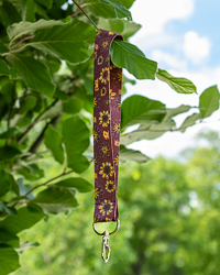 CMU Action C Maroon & Gold Daisy Print Wrist Lanyard